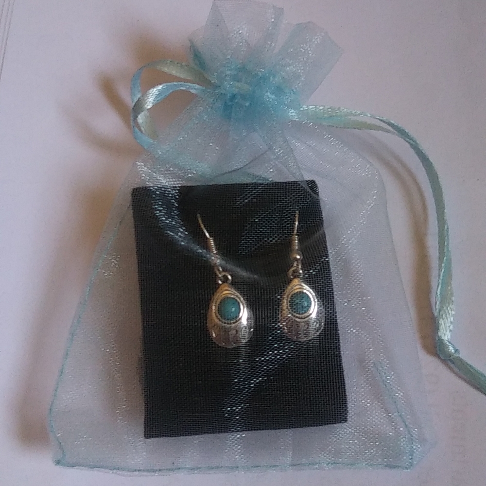Sterling silver with turquoise gem